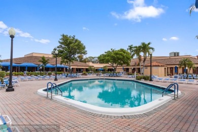 Experience luxury in this 2-bed, 2-bath unit in the 55+ on Sunrise Lakes Phase III in Florida - for sale on GolfHomes.com, golf home, golf lot