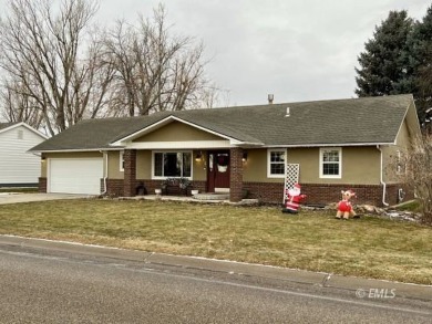 This beautifully updated home includes 5 bedrooms, 3 bathrooms on Miles City Town and Country Club in Montana - for sale on GolfHomes.com, golf home, golf lot