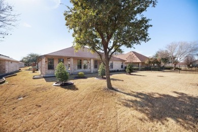 Stunning single story home at Robson Ranch that truly has it on Wildhorse Golf Club of Robson Ranch in Texas - for sale on GolfHomes.com, golf home, golf lot