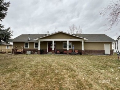 This beautifully updated home includes 5 bedrooms, 3 bathrooms on Miles City Town and Country Club in Montana - for sale on GolfHomes.com, golf home, golf lot