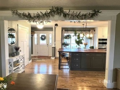 This beautifully updated home includes 5 bedrooms, 3 bathrooms on Miles City Town and Country Club in Montana - for sale on GolfHomes.com, golf home, golf lot