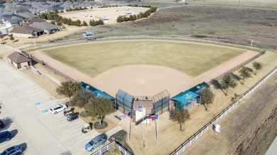 Stunning single story home at Robson Ranch that truly has it on Wildhorse Golf Club of Robson Ranch in Texas - for sale on GolfHomes.com, golf home, golf lot