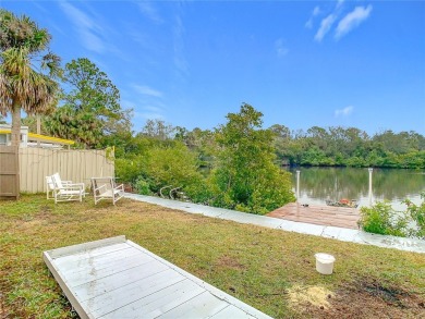 This waterfront property truly presents an incredible on Gulf Harbors Golf Course in Florida - for sale on GolfHomes.com, golf home, golf lot
