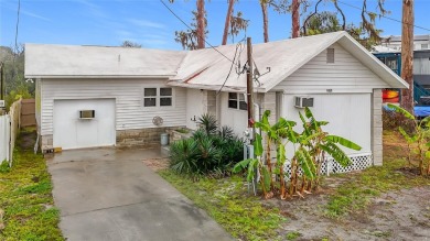 This waterfront property truly presents an incredible on Gulf Harbors Golf Course in Florida - for sale on GolfHomes.com, golf home, golf lot