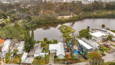 This waterfront property truly presents an incredible on Gulf Harbors Golf Course in Florida - for sale on GolfHomes.com, golf home, golf lot