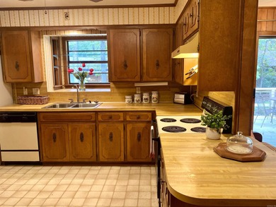 This late 70's built home is so WELL PRESERVED, you'll feel like on DeSoto Golf Course in Arkansas - for sale on GolfHomes.com, golf home, golf lot