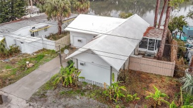 This waterfront property truly presents an incredible on Gulf Harbors Golf Course in Florida - for sale on GolfHomes.com, golf home, golf lot