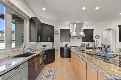Strikingly situated in the gated community of Buffalo Ridge on Country Club at Castle Pines in Colorado - for sale on GolfHomes.com, golf home, golf lot