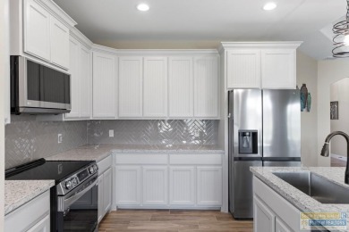 115 Torrey Pines - Beautiful 3BD/2BA open-concept home with lake on South Padre Island Golf Club in Texas - for sale on GolfHomes.com, golf home, golf lot