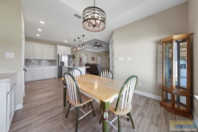 115 Torrey Pines - Beautiful 3BD/2BA open-concept home with lake on South Padre Island Golf Club in Texas - for sale on GolfHomes.com, golf home, golf lot