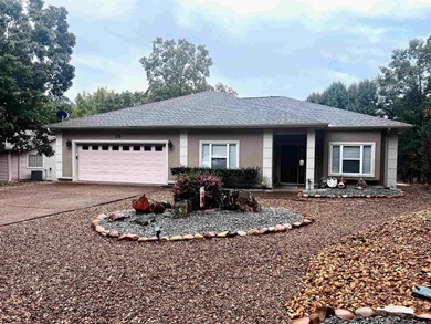 Picture yourself relaxing on the covered patio, enjoying your on Coronado Golf Course in Arkansas - for sale on GolfHomes.com, golf home, golf lot