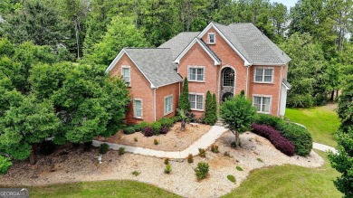 Welcome to 805 Cog Hill - Country Club Living at Its Finest! on Eagles Landing Country Club in Georgia - for sale on GolfHomes.com, golf home, golf lot