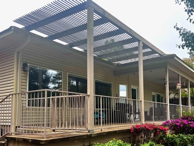 Picture yourself relaxing on the covered patio, enjoying your on Coronado Golf Course in Arkansas - for sale on GolfHomes.com, golf home, golf lot