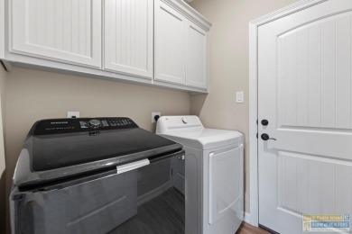 115 Torrey Pines - Beautiful 3BD/2BA open-concept home with lake on South Padre Island Golf Club in Texas - for sale on GolfHomes.com, golf home, golf lot