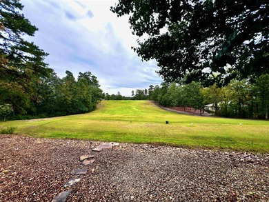 Picture yourself relaxing on the covered patio, enjoying your on Coronado Golf Course in Arkansas - for sale on GolfHomes.com, golf home, golf lot