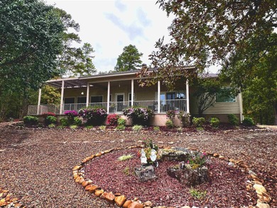 Picture yourself relaxing on the covered patio, enjoying your on Coronado Golf Course in Arkansas - for sale on GolfHomes.com, golf home, golf lot