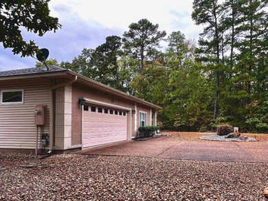 Picture yourself relaxing on the covered patio, enjoying your on Coronado Golf Course in Arkansas - for sale on GolfHomes.com, golf home, golf lot