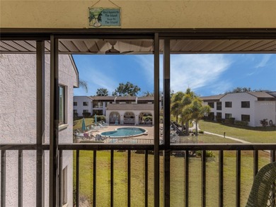 This  2 bedroom/2 bathroom condo is one of three on the second on Capri Isle Golf Club in Florida - for sale on GolfHomes.com, golf home, golf lot
