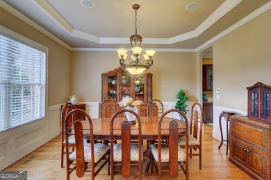 Welcome to 805 Cog Hill - Country Club Living at Its Finest! on Eagles Landing Country Club in Georgia - for sale on GolfHomes.com, golf home, golf lot