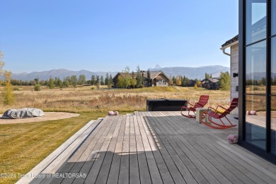 Stunning 4 bed, 4.5 bath Tributary Cabin with pond & Teton on Huntsman Springs Golf Club in Idaho - for sale on GolfHomes.com, golf home, golf lot