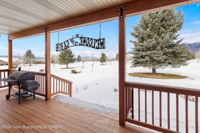 This well-kept, cedar-sided custom home on the golf course in on Star Valley RV Golf Course in Wyoming - for sale on GolfHomes.com, golf home, golf lot