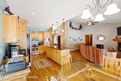 This well-kept, cedar-sided custom home on the golf course in on Star Valley RV Golf Course in Wyoming - for sale on GolfHomes.com, golf home, golf lot