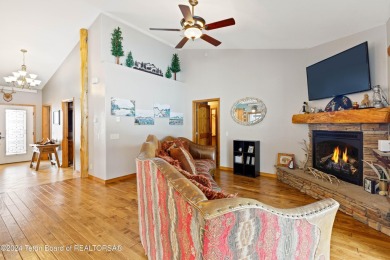 This well-kept, cedar-sided custom home on the golf course in on Star Valley RV Golf Course in Wyoming - for sale on GolfHomes.com, golf home, golf lot