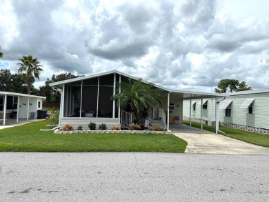 THIS 2-BEDROOM, 2-BATHROOM HOME HAS BEEN BEAUTIFULLY UPDATED AND on Anglers Green Golf Course in Florida - for sale on GolfHomes.com, golf home, golf lot