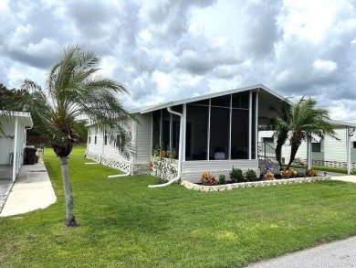 THIS 2-BEDROOM, 2-BATHROOM HOME HAS BEEN BEAUTIFULLY UPDATED AND on Anglers Green Golf Course in Florida - for sale on GolfHomes.com, golf home, golf lot