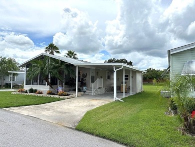 THIS 2-BEDROOM, 2-BATHROOM HOME HAS BEEN BEAUTIFULLY UPDATED AND on Anglers Green Golf Course in Florida - for sale on GolfHomes.com, golf home, golf lot