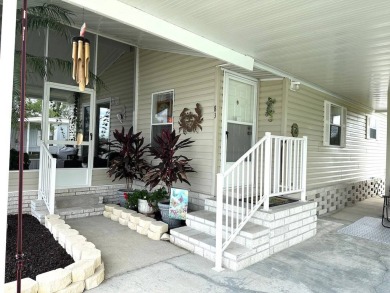 THIS 2-BEDROOM, 2-BATHROOM HOME HAS BEEN BEAUTIFULLY UPDATED AND on Anglers Green Golf Course in Florida - for sale on GolfHomes.com, golf home, golf lot