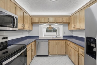 Welcome to your upgraded lakeside 2-bed, 2-bath condo with on Sunrise Lakes Phase III in Florida - for sale on GolfHomes.com, golf home, golf lot