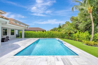 Exquisite two-story pool home, nestled in the prestigious on Parkland Golf Club in Florida - for sale on GolfHomes.com, golf home, golf lot