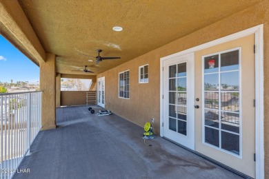 Stunning lakeview pool home located in the Residential Estates on London Bridge Golf Course in Arizona - for sale on GolfHomes.com, golf home, golf lot