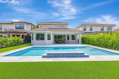 Exquisite two-story pool home, nestled in the prestigious on Parkland Golf Club in Florida - for sale on GolfHomes.com, golf home, golf lot