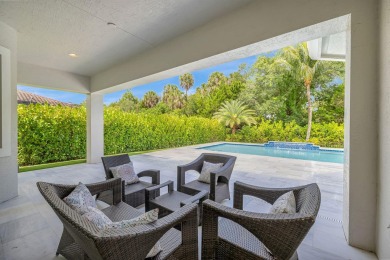 Exquisite two-story pool home, nestled in the prestigious on Parkland Golf Club in Florida - for sale on GolfHomes.com, golf home, golf lot