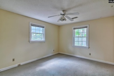 This beautiful all-brick colonial home in the highly sought on Spring Valley Country Club in South Carolina - for sale on GolfHomes.com, golf home, golf lot