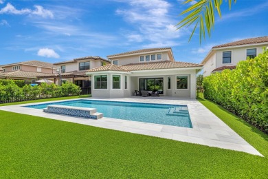 Exquisite two-story pool home, nestled in the prestigious on Parkland Golf Club in Florida - for sale on GolfHomes.com, golf home, golf lot