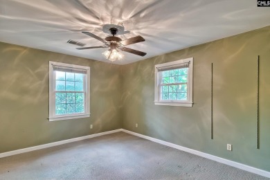 This beautiful all-brick colonial home in the highly sought on Spring Valley Country Club in South Carolina - for sale on GolfHomes.com, golf home, golf lot