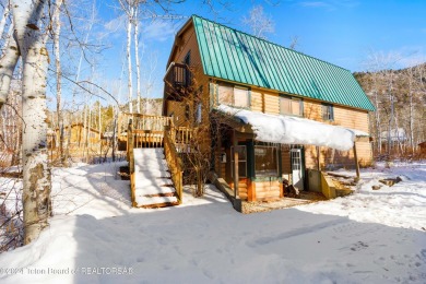 Charming 5-bedroom home located on a peaceful, tree-lined street on Cedar Creek Golf Course in Wyoming - for sale on GolfHomes.com, golf home, golf lot