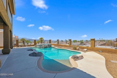 Stunning lakeview pool home located in the Residential Estates on London Bridge Golf Course in Arizona - for sale on GolfHomes.com, golf home, golf lot