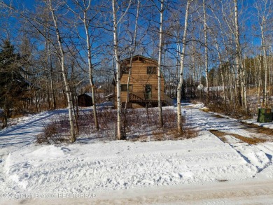 Charming 5-bedroom home located on a peaceful, tree-lined street on Cedar Creek Golf Course in Wyoming - for sale on GolfHomes.com, golf home, golf lot