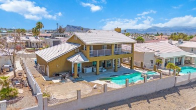 Stunning lakeview pool home located in the Residential Estates on London Bridge Golf Course in Arizona - for sale on GolfHomes.com, golf home, golf lot