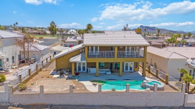 Stunning lakeview pool home located in the Residential Estates on London Bridge Golf Course in Arizona - for sale on GolfHomes.com, golf home, golf lot