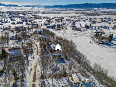 Charming 5-bedroom home located on a peaceful, tree-lined street on Cedar Creek Golf Course in Wyoming - for sale on GolfHomes.com, golf home, golf lot