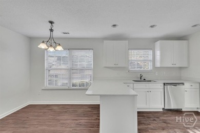 A beautifully situated home in the heart of Rincon, Georgia on Lost Plantation Golf Club in Georgia - for sale on GolfHomes.com, golf home, golf lot