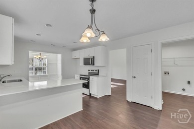 A beautifully situated home in the heart of Rincon, Georgia on Lost Plantation Golf Club in Georgia - for sale on GolfHomes.com, golf home, golf lot