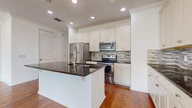 Discover the opportunity to own a beautiful townhome in the on Eagle Creek Golf Club in Florida - for sale on GolfHomes.com, golf home, golf lot