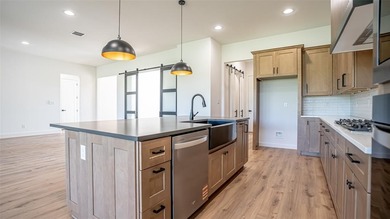 New build by Aubree Homes in sought after Thomas Crossing home on Southern Oaks Golf Club in Texas - for sale on GolfHomes.com, golf home, golf lot