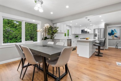 Nestled on a quiet dead-end street, this beautifully updated on Bolduc Park Golf Course in New Hampshire - for sale on GolfHomes.com, golf home, golf lot